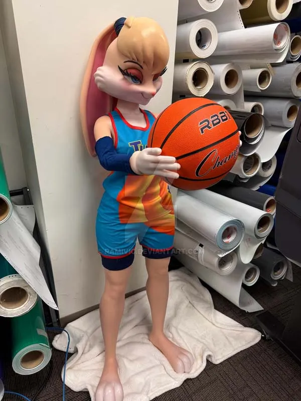Lola is holding a basketball